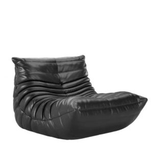 Side-angled view of Togo-style lounge chair in black vegan leather, showcasing its distinctive cushioned design and sleek contours, ideal for modern and stylish interiors.