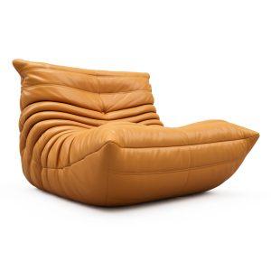 Angled front shot of the Single Seater Lounge Chair in Retro Tan Vegan Leather, PRO EDITION, inspired by Michel Ducaroy’s Togo Fireside.