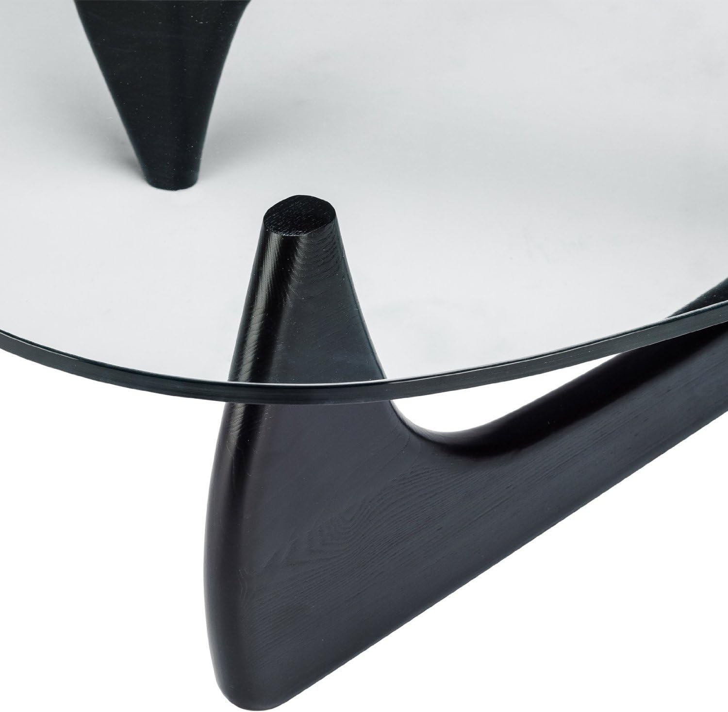Close-up of Black Noguchi Table Replica with a 12mm glass top, showcasing the detailed texture of the black sculptural base and the smooth glass surface. Inspired by Isamu Noguchi, this mid-century modern piece combines intricate design with contemporary style.