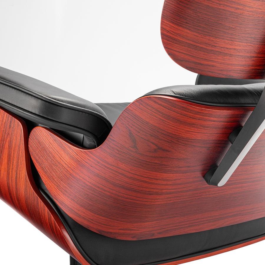 Close-up of the back of the XL Tall Replica Eames Lounge Chair in rosewood and black leather, emphasizing the classic design details first introduced in 1956.